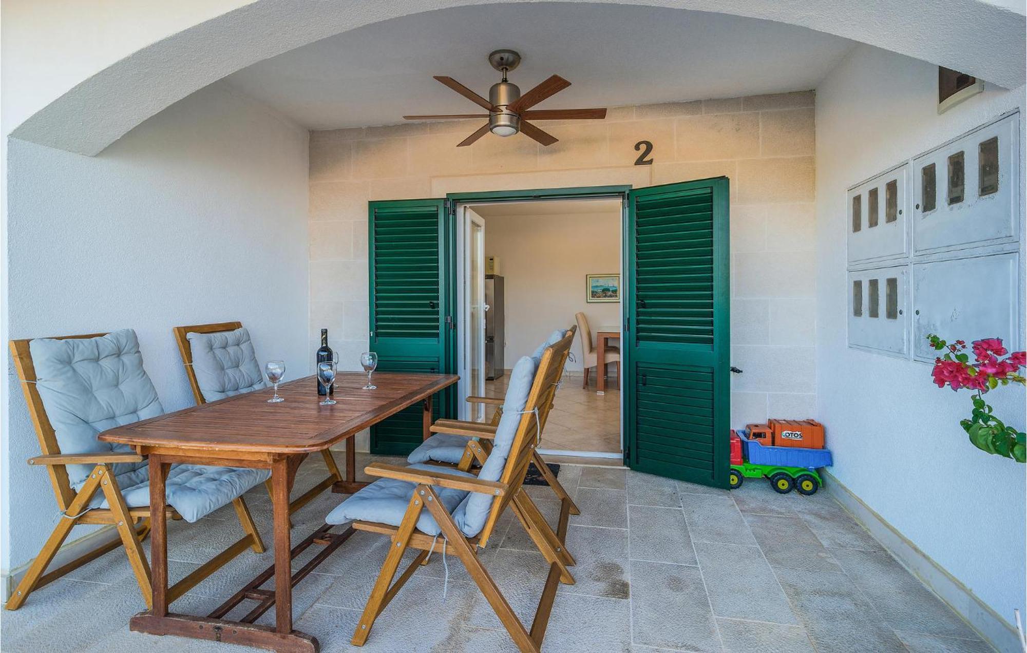 Nice Home In Postira With Outdoor Swimming Pool Exterior photo